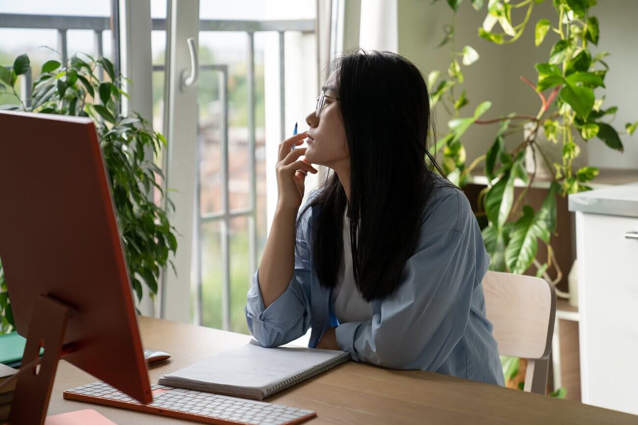 Woman thinking about financial security before changing careers after 40 